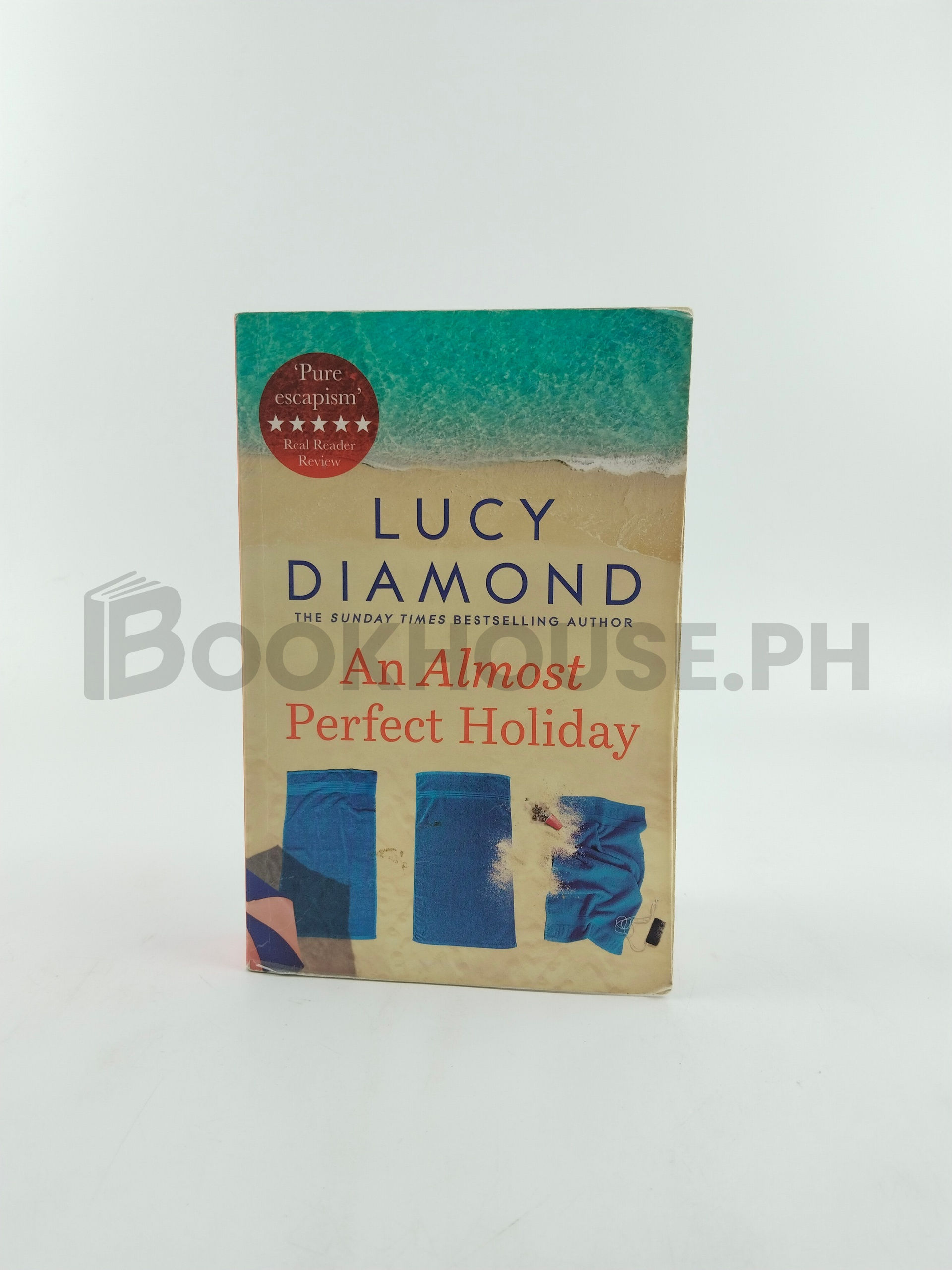 An Almost Perfect Holiday by Lucy Diamond