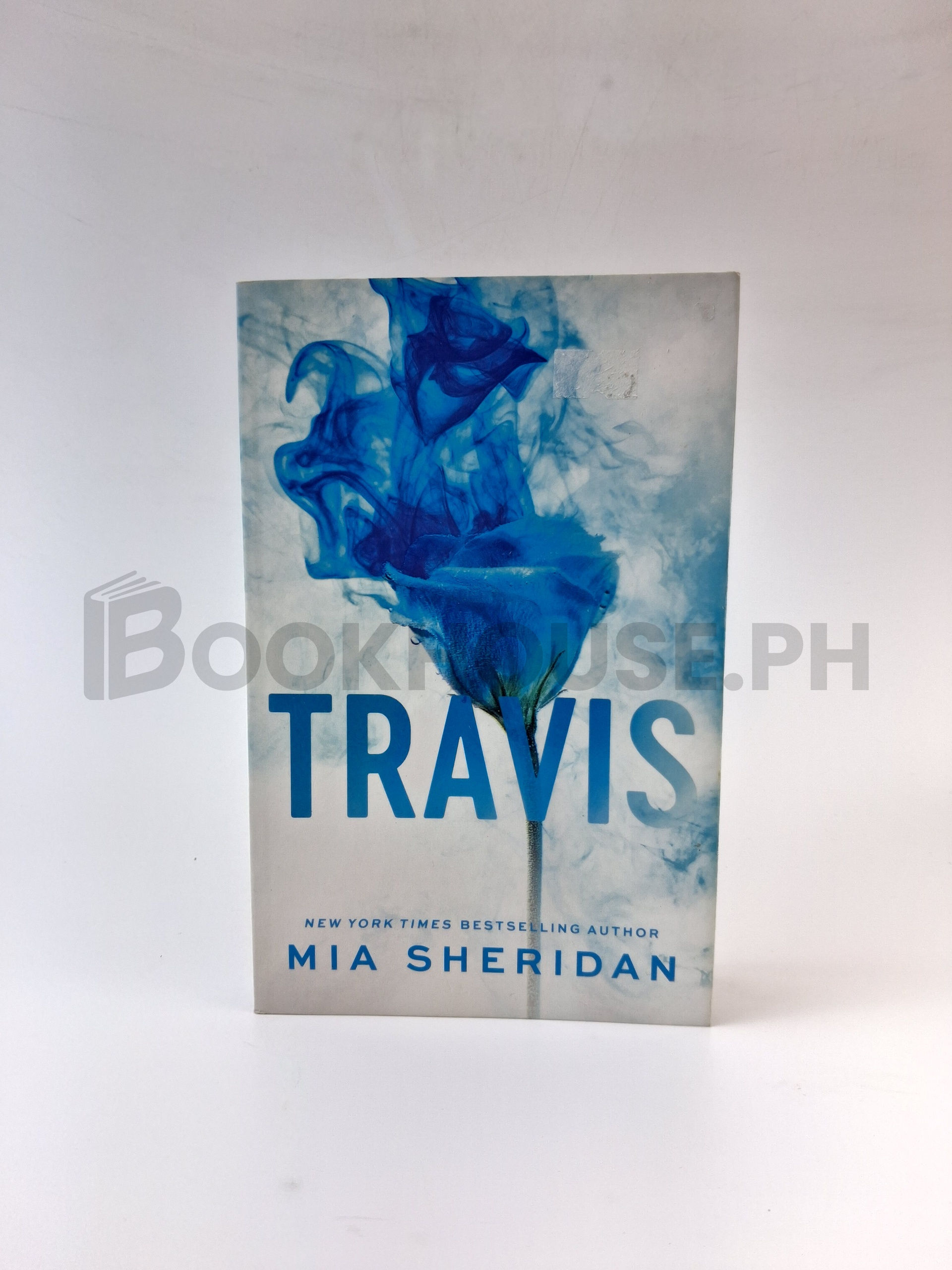 Travis by Mia Sheridan